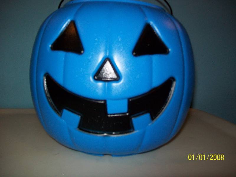 lot 95 image: Decoration 1 Plastic Blue  2 Orange Pumpkins with Smiling Face & Handle. Condition Previously Owned.