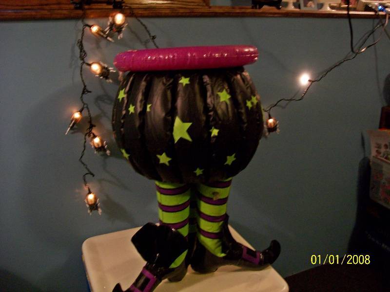 lot 89 image: Decoration Plastic Blow Up Witch Bottom with Shoes & String of Spider Lights.