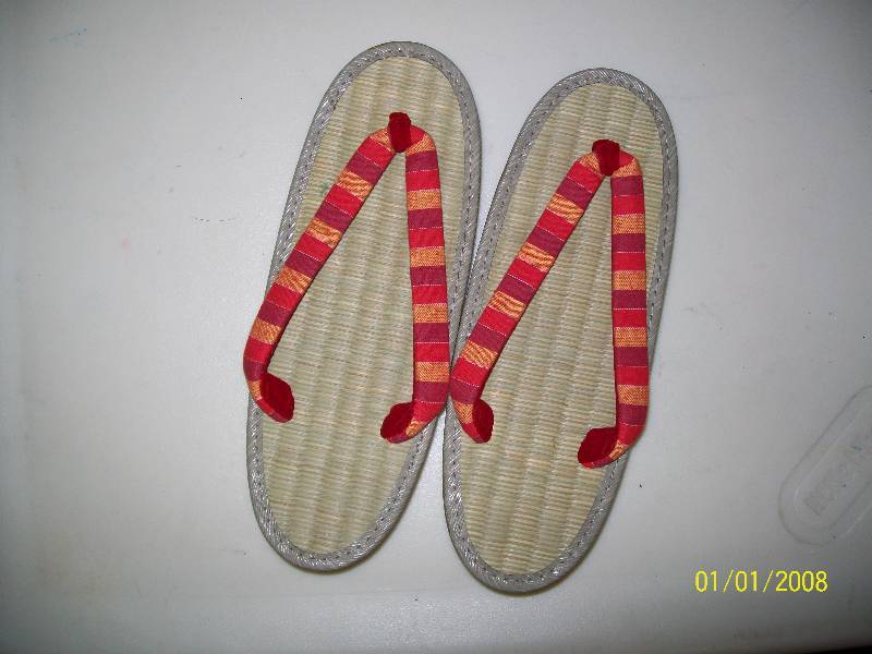 lot 81 image: AdultChild Costume Japanese Sandal. Unknown Size. Seems Smallish.