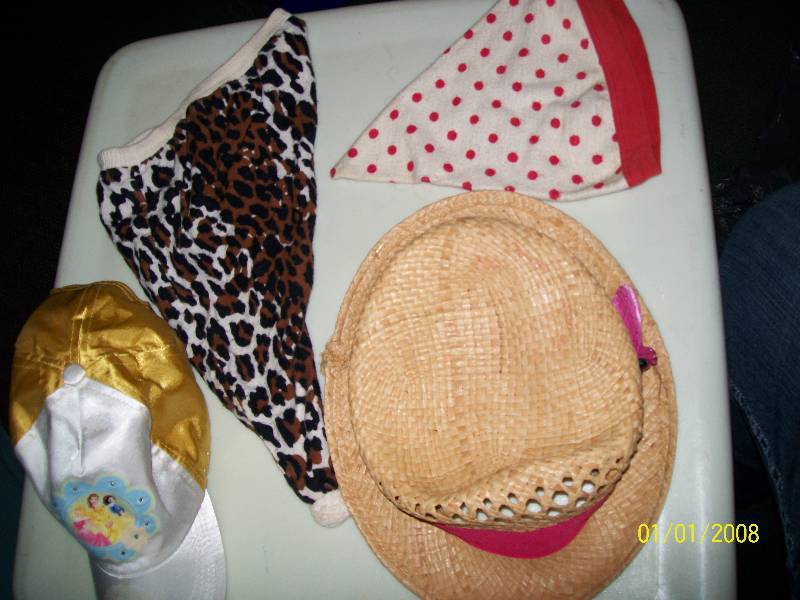 lot 79 image: Child Costume 4 Hats. Princess baseball cap, Straw Summer Hat, Two Sleep Caps,