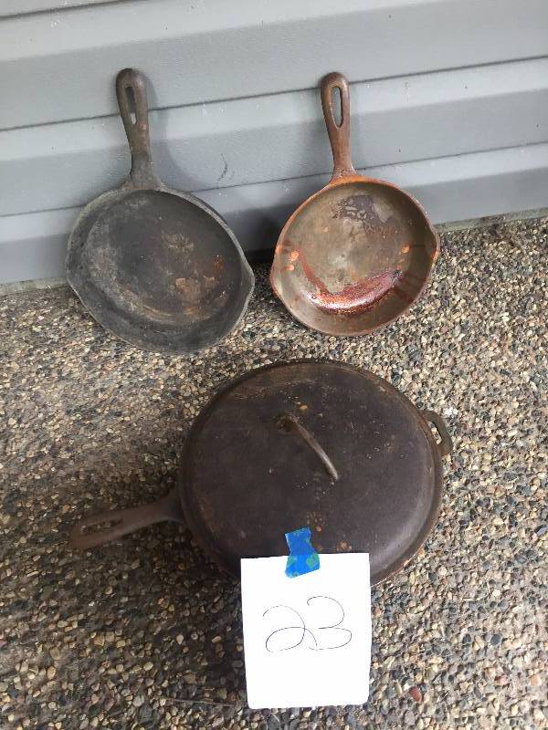 lot 23 image: CAST IRON FRYING PANS