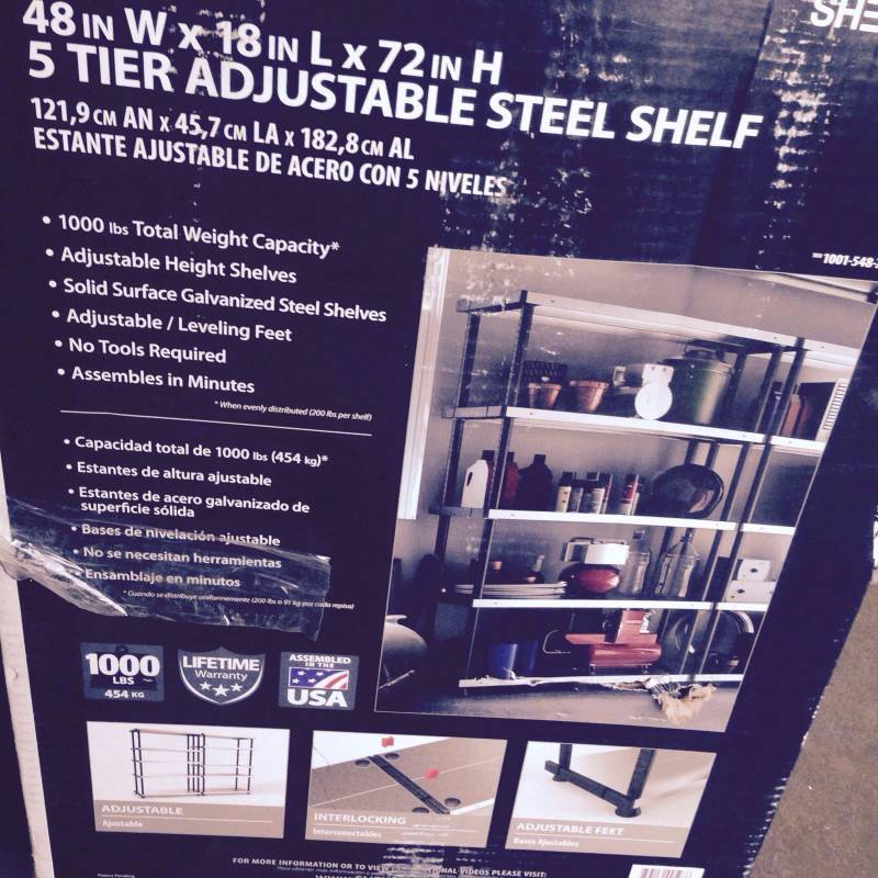 lot 57 image: 5 Tier Adjustable Steel Shelf- dent on shelf see picture