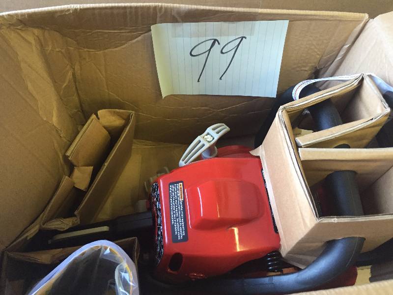 lot 99 image: Homelite 14 in Gas Chain Saw in like new condition