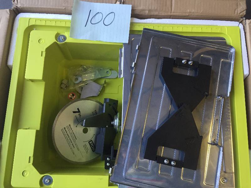 lot 100 image: Ryobi 7 Wet Tile Saw in like New Condition