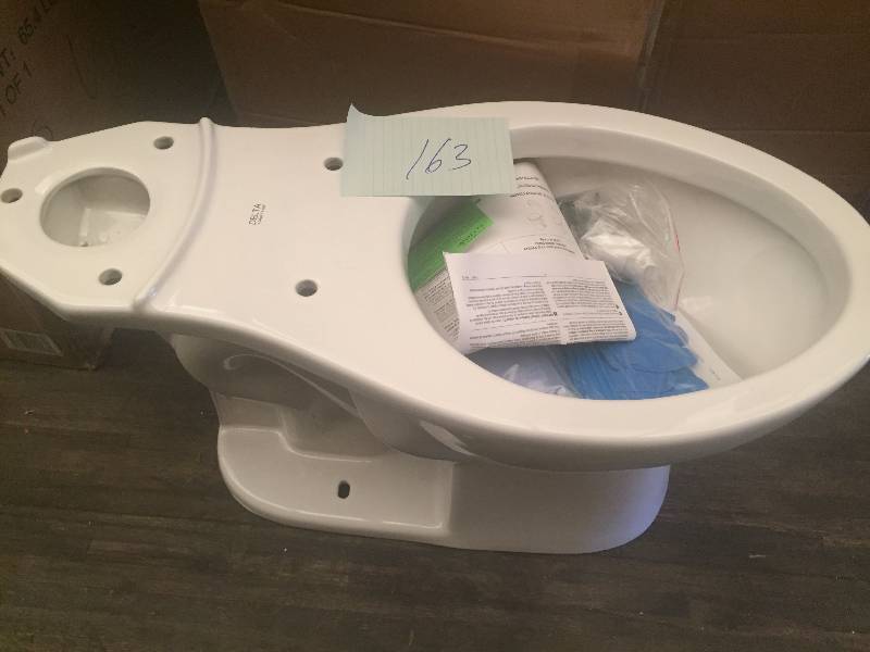 Delta Toilet and Toilet seat no tank included KX Real Deals Tool