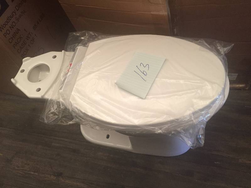 lot 163 image: Delta Toilet and Toilet seat- no tank included