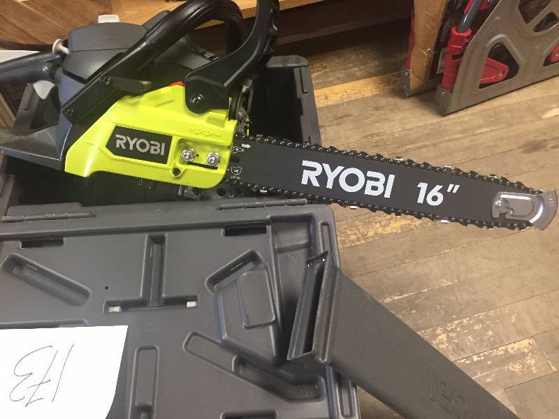 lot 173 image: Ryobi 16 in. 37cc 2-Cycle Gas Chainsaw with Heavy Duty Case in like new condition