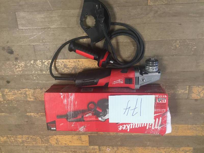 lot 174 image: Milwaukee 13 Amp 5 in. Small Angle Grinder with Lock-On Slide Switch in like new condition