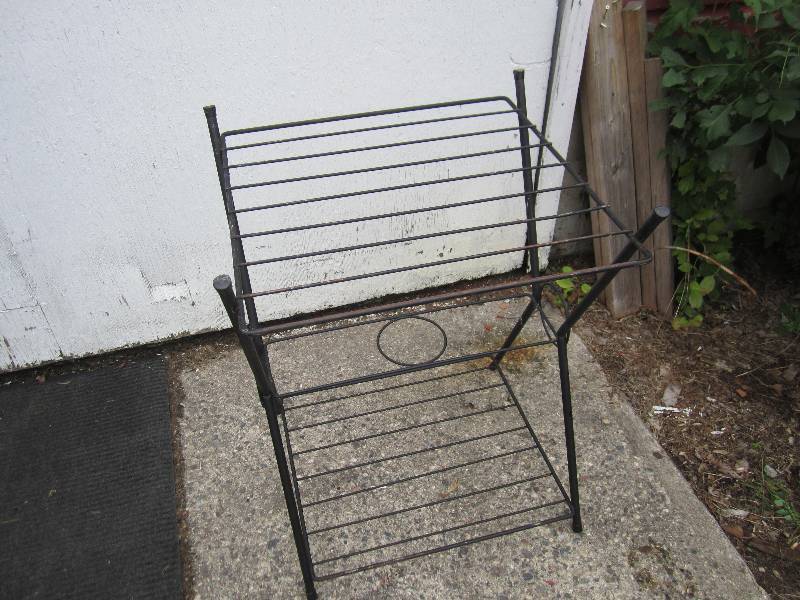 lot 24 image: Metal wire table, 21 x 21 and 29 t...