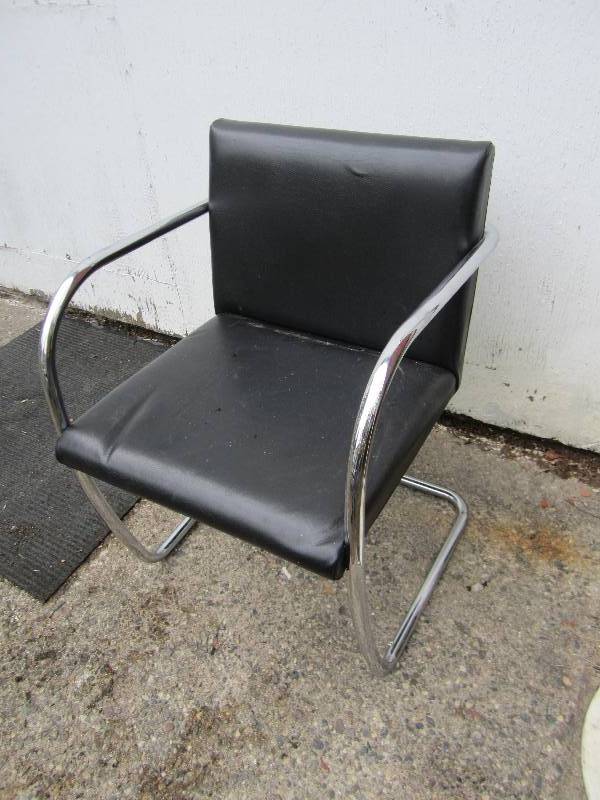 lot 39 image: Black vinyl upholstered chair...