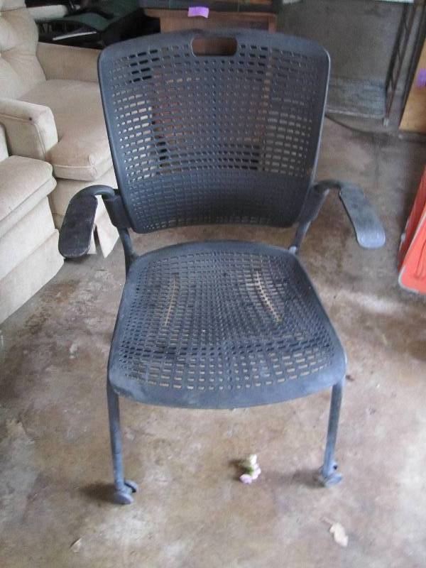 lot 58 image: Plastic chair on wheels...