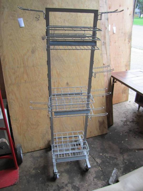 lot 86 image: Metal display on wheels, 5 tall...