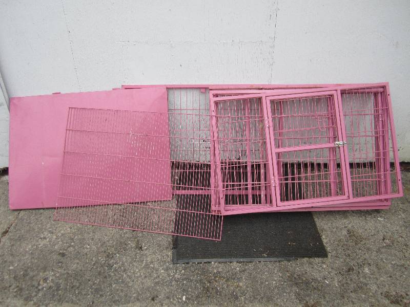 lot 97 image: Pink pet kennel, walls are 42 x 27...