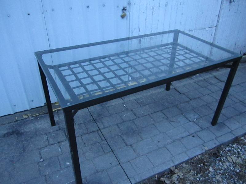 lot 12 image: Glass top table with metal base, 57...