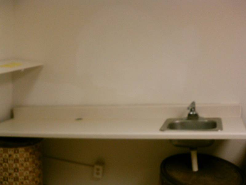 lot 29 image: Counter top and stainless steel sink