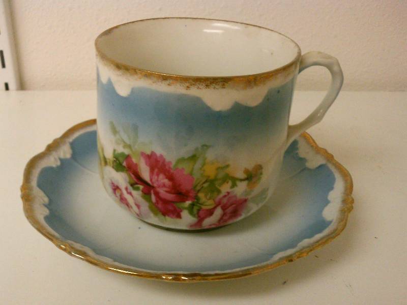 lot 67 image: Vintage Blue cup and saucer