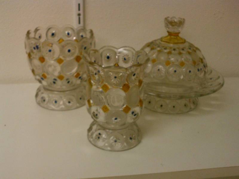 lot 69 image: bubble glass with sapphire blue and gold accents.
