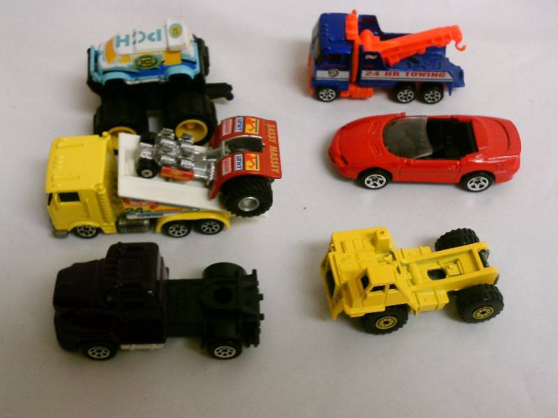 lot 125 image: Hot wheels, lot of 6, Sassy Massey (truck, trailer, drag tractor)