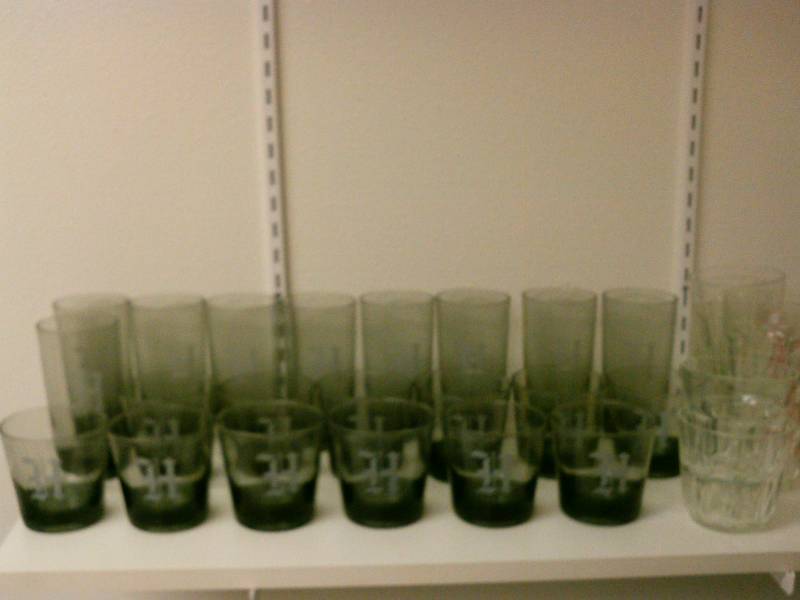 lot 128 image: Monogram H glass set.  Lot of 29