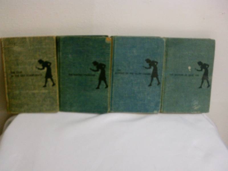 lot 196 image: Vintage, vintage Nancy Drew Books, hardcover, lot of 4, copyrights in the 1930s