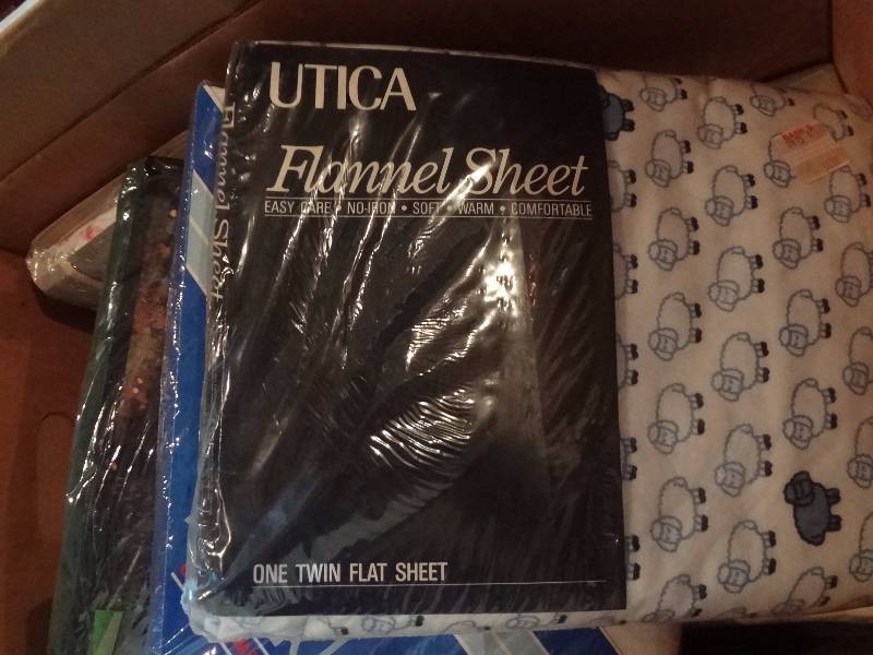 lot 112 image: Box of Flannel sheets