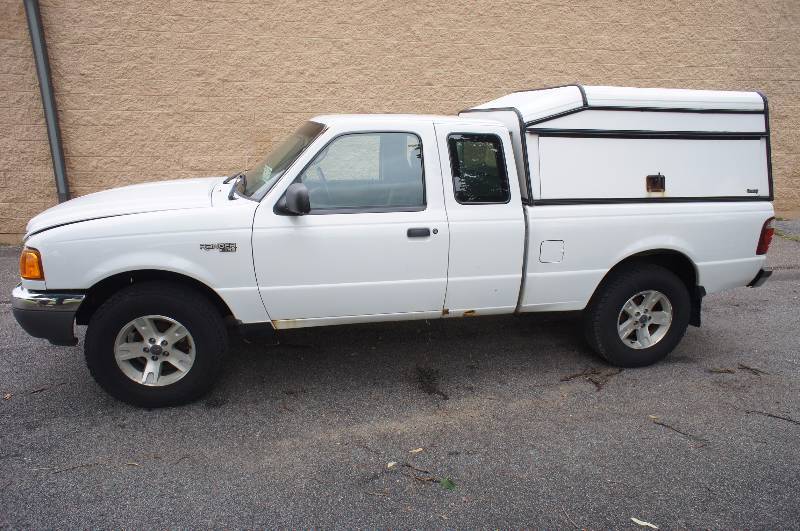 lot 4 image: 2003 FORD RANGER  XLT - 4.0 L - SOHC - TOPPER - LOTS OF STORAGE - (#3023)