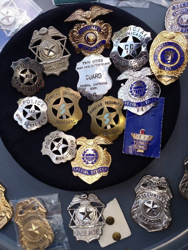 Lot of security badges, some appear very old and collectable