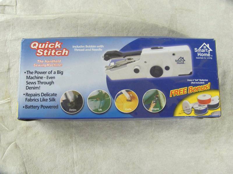 lot 283 image: Brand New Quick Stitch Battery Powered Handheld Sewing Machine