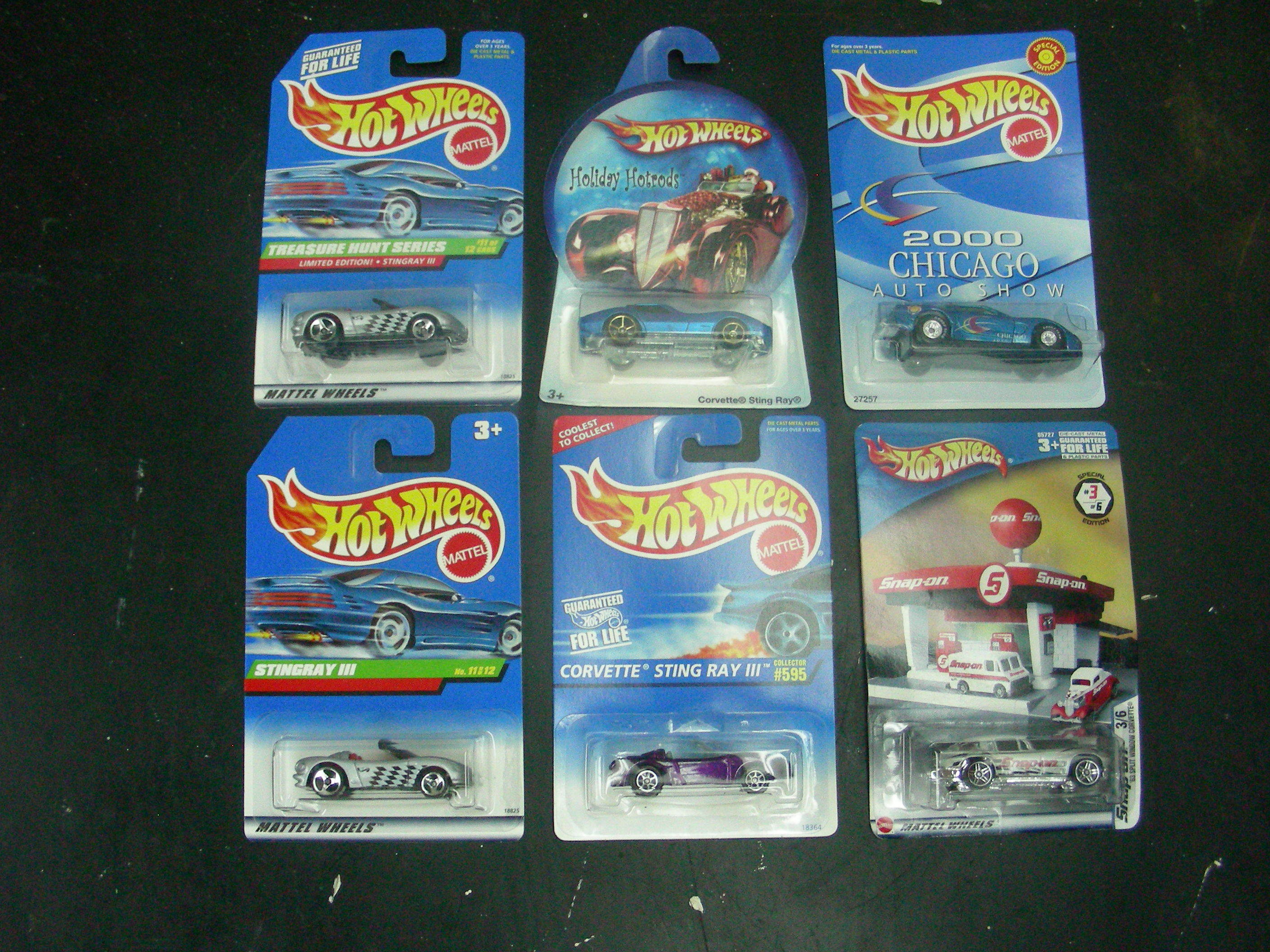 lot 45 image: 6 MINT on Card Hot Wheels Corvettes