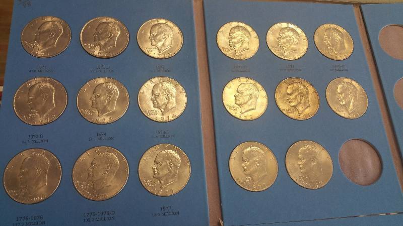 GROUP OF 43 EISENHOWER IKE DOLLARS IN 2 BOOKS