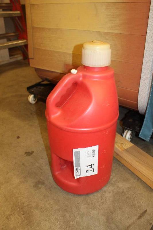 lot 24 image: 5-Gallon plastic racing fuel jug
