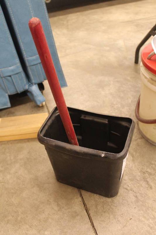lot 26 image: Windshield washer squeegee and bucket