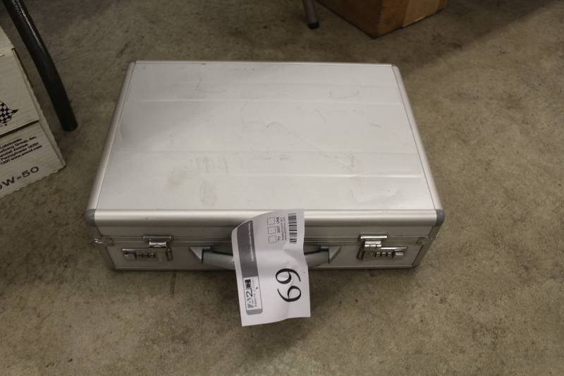 lot 69 image: Aluminum briefcase with locking combination