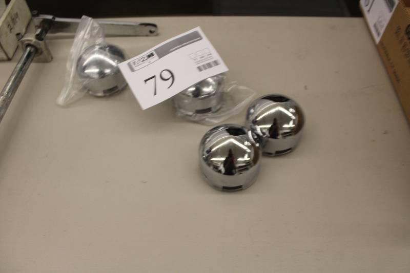 lot 79 image: Champion wheel center caps