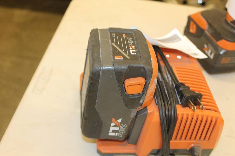 lot 57 image: Lot of rigid battery charger with non-operating battery
