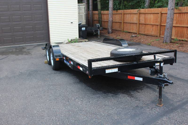 lot 1 image: 18x82 Sure-trac trailer with dovetail