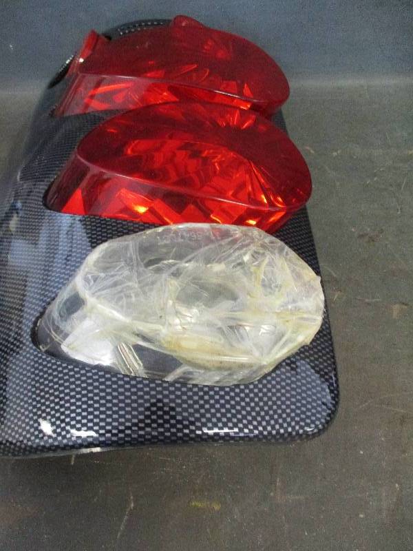 lot 17 image: Rear Taillight Assembly & Covers