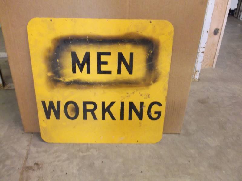 Men Working Sign