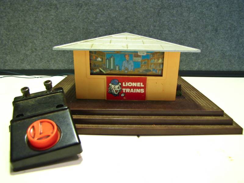 lot 12 image: Control switch No. 90 and a building