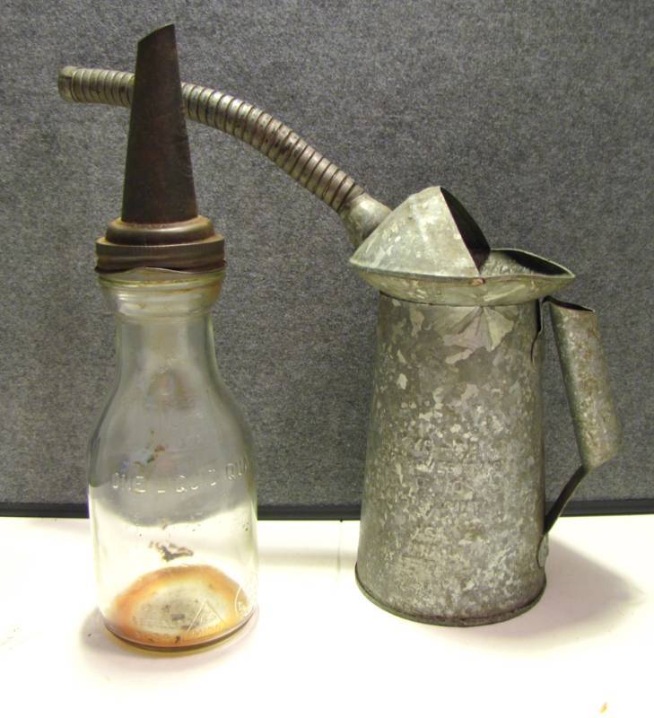 lot 45 image: oli bottle with spout, oil can with spout