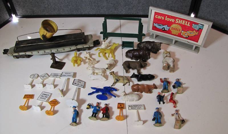 lot 52 image: train accessories signs and people