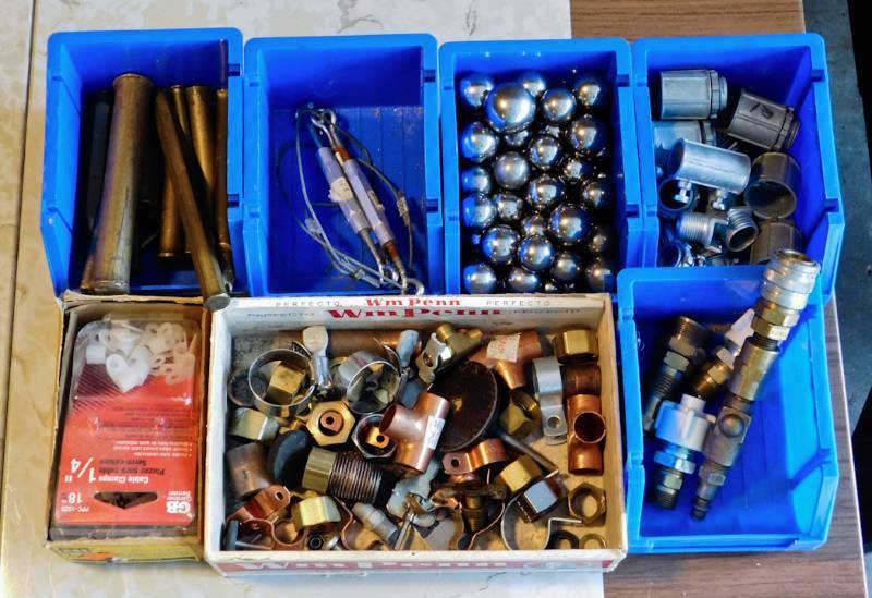several bins of useful hardware items
