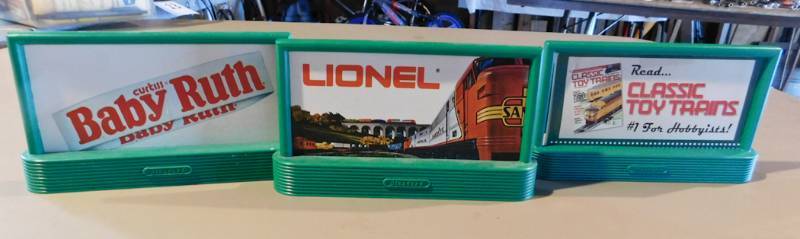 3 Lionel Bilboard signs