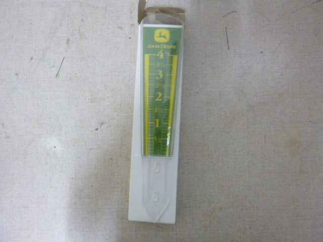 lot 279 image: John Deere Rain Gauge