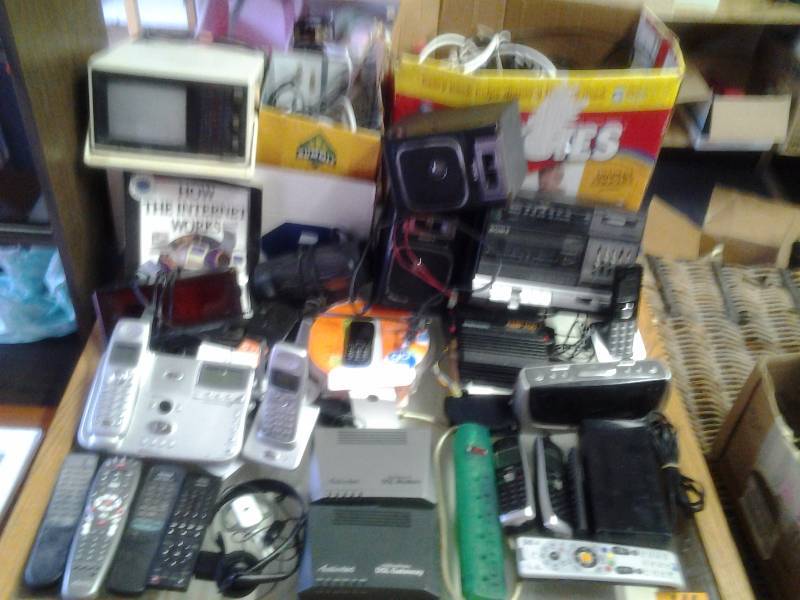 lot 17 image: Large Lot (4-Boxes) Of Assorted Electronics, Phones, Radios, Clock Radios, Wires