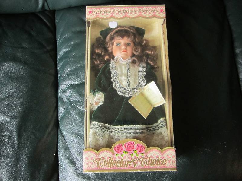 lot 26 image: Bisque porcelain doll...