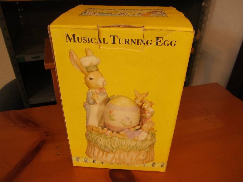 lot 114 image: Musical turning egg...