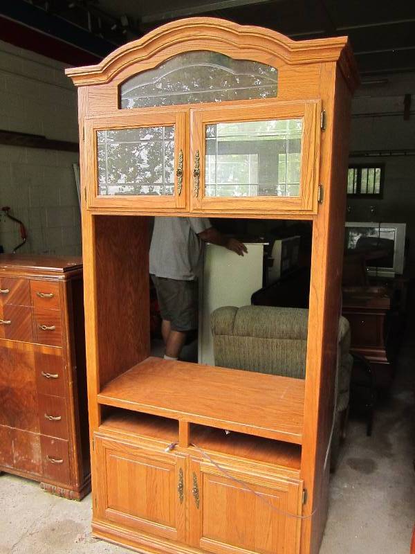 lot 132 image: Wood entertainment center, lighted,...