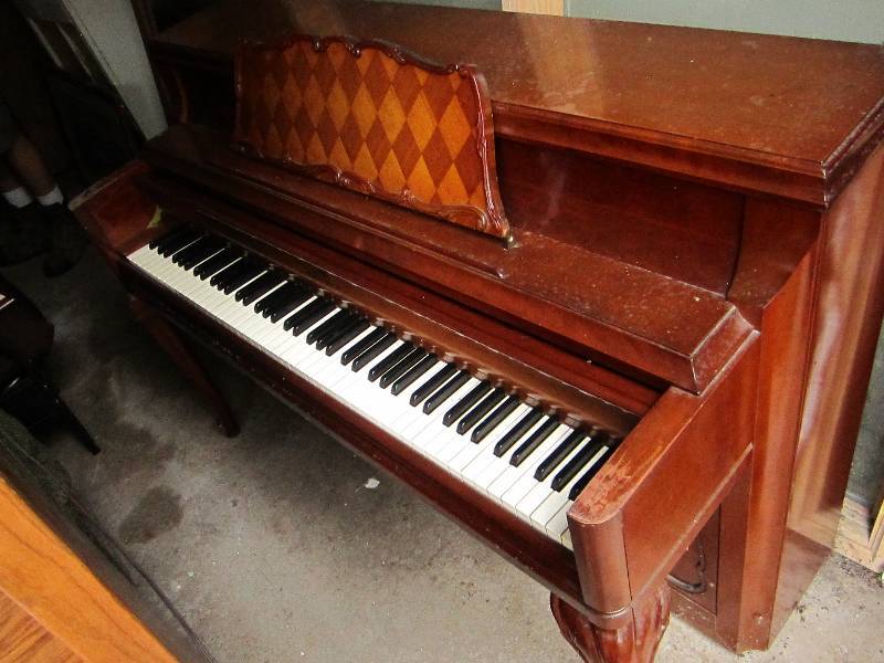 lot 137 image: Wood piano, 57 wide...