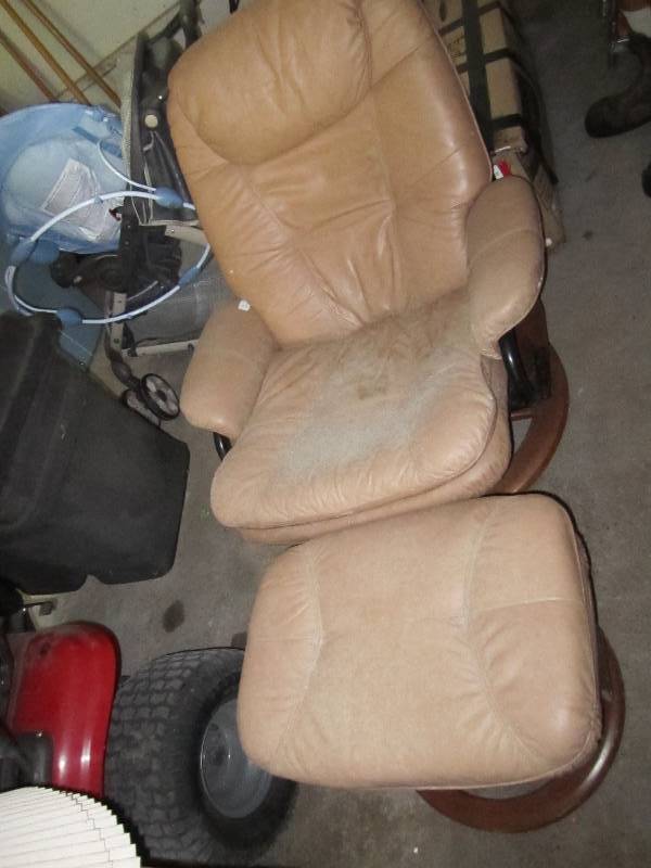 lot 141 image: Tan chair and ottoman...